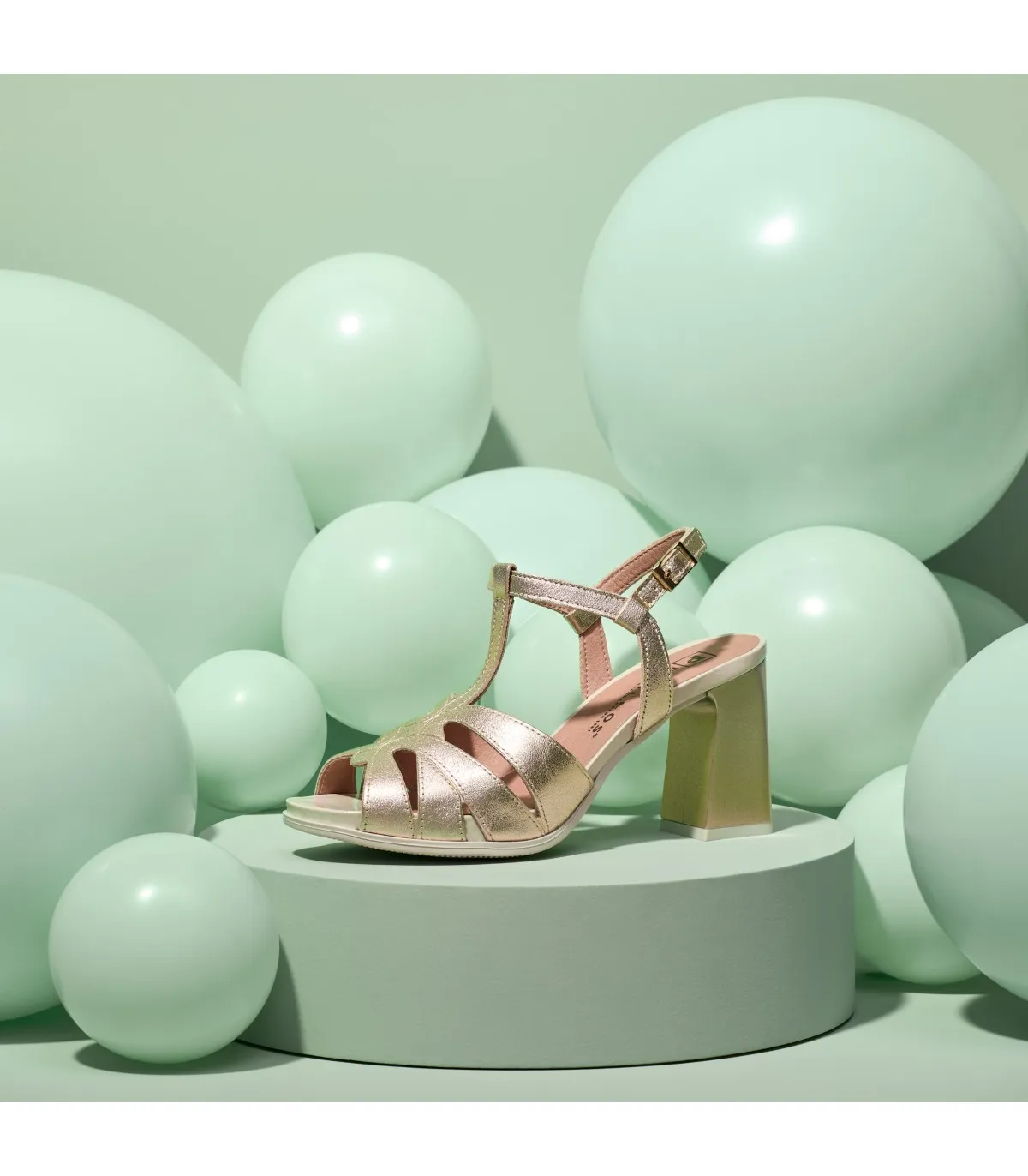 Gold laminated fantasy high heel sandal for women.